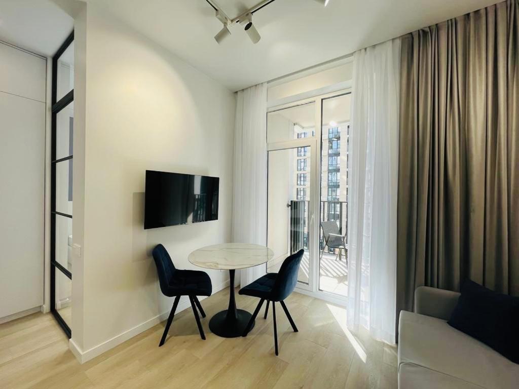 Modern Apartment In The Old Town Киев Экстерьер фото